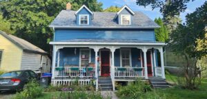 blue home after roof repair
